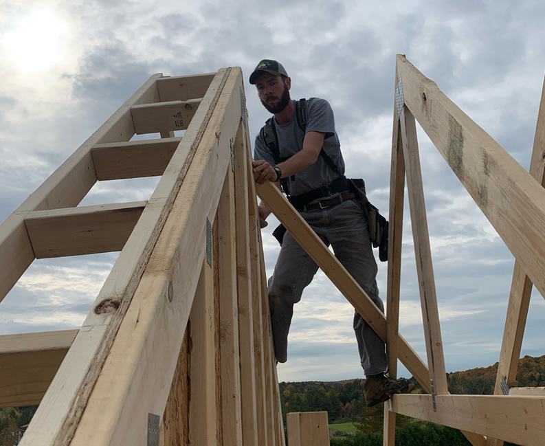 skilled carpenter framing roof structure